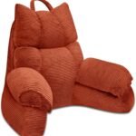 Brown ribbed lounge chair on a white background
