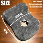 A dark gray contoured seat cushion shown on a wooden surface with overlaid size measurements: 12 IN overall, 10.6 IN width, and 3.