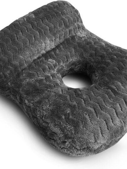 A dark gray plush lumbar pillow with a textured wavy pattern, shown on a clean white background.