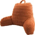 An orange-brown ribbed corduroy Y-back pillow with a top hanging loop, shown on a solid white background.
